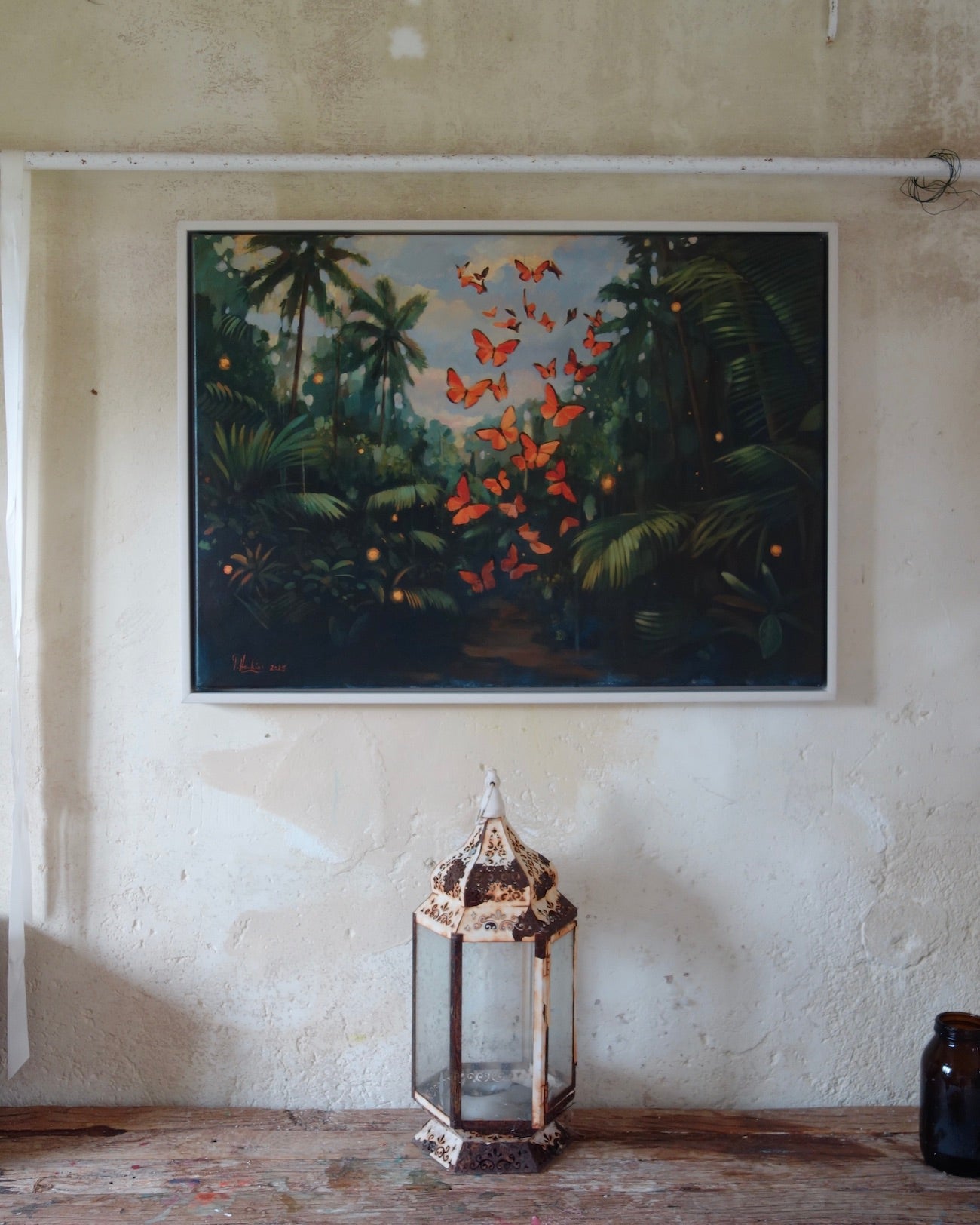 Painting of the tropical jungle with vibrant red butterflies rising. By Pete Hawkins